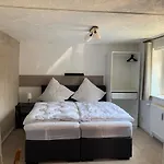 Min Hüsing *